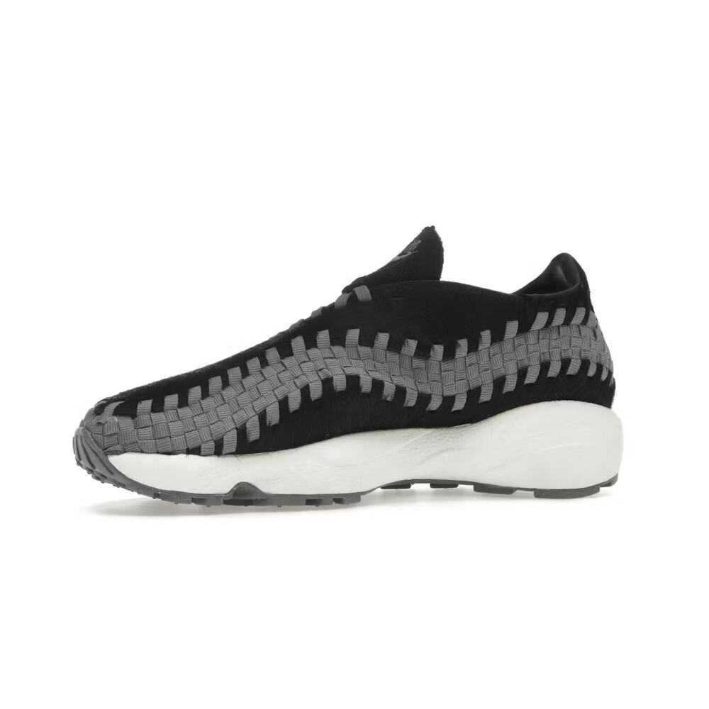 Nike Women's Air Footscape Woven in Black Smoke Grey women’s size 5.5. NWOT.